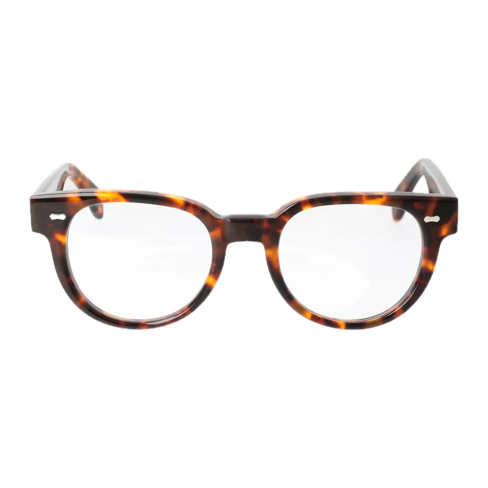 A pair of round, Palm Eco Spotted Havana Optical 51mm eyeglasses with clear lenses, isolated on a black background by The Bespoke Dudes.