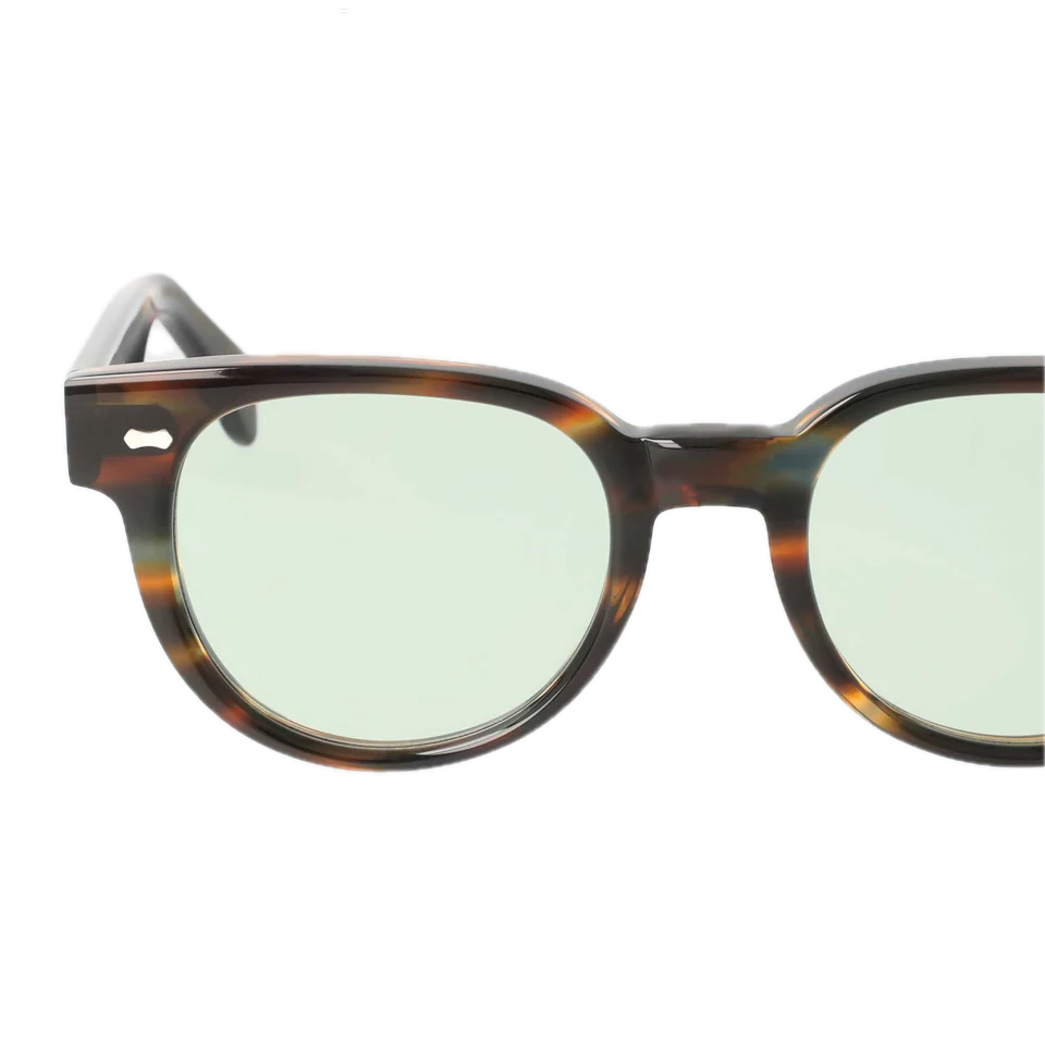 A pair of handcrafted Palm River Light Green Sunglasses 51mm with round lenses and a translucent bottom, isolated on a white background by The Bespoke Dudes.