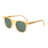 A pair of handmade, Twill Matte Champagne Green Lenses 49mm sunglasses with tinted lenses isolated on a black background by The Bespoke Dudes.