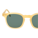 A pair of The Bespoke Dudes sunglasses with a Twill Matte Champagne frame and Green Lenses 49mm isolated on a black background.
