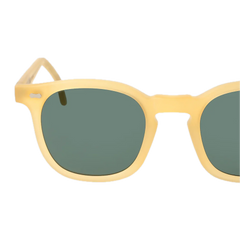 A pair of The Bespoke Dudes sunglasses with a Twill Matte Champagne frame and Green Lenses 49mm isolated on a black background.