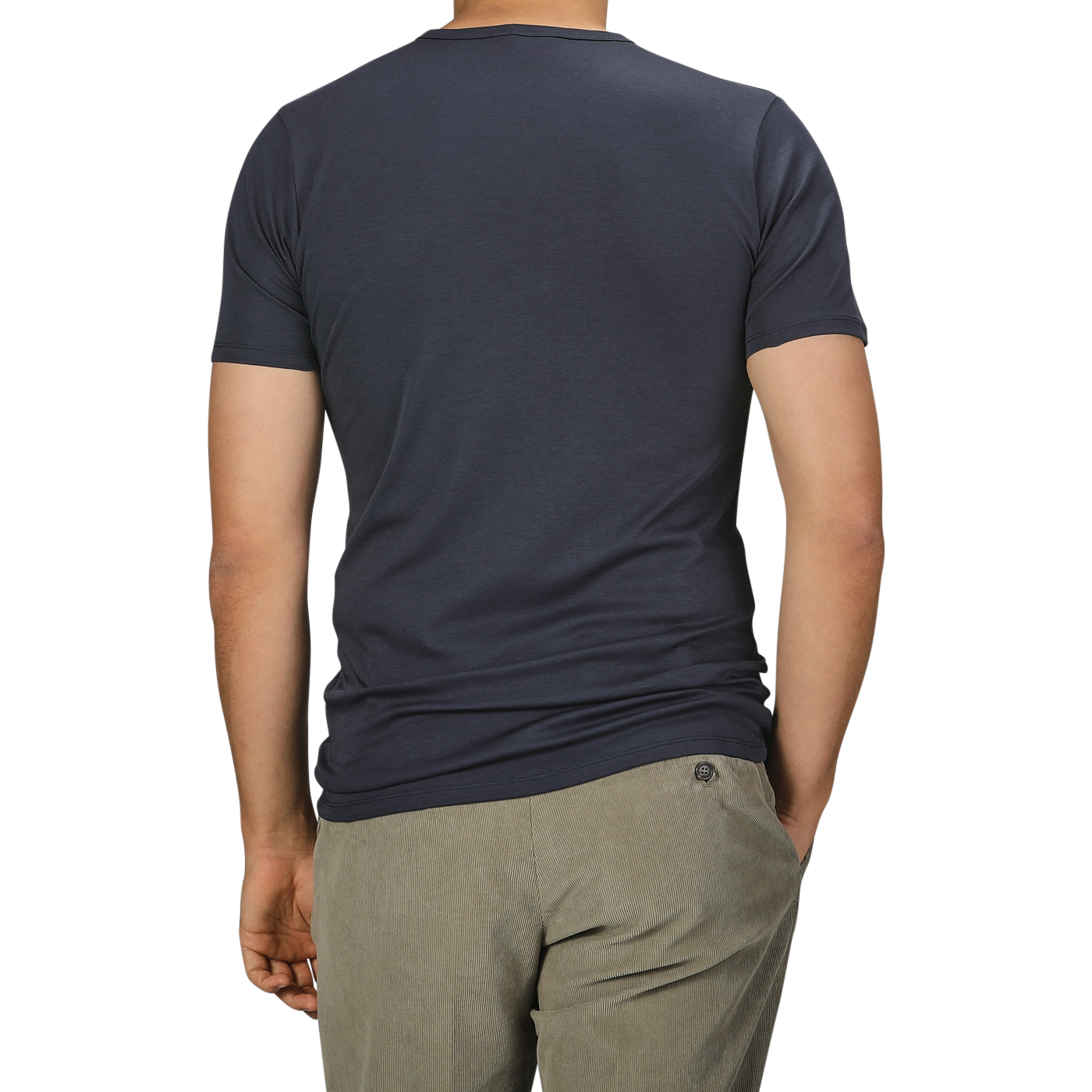 A person wearing The White Briefs' Parisian Night Pima Cotton Earth T-Shirt in dark gray and light gray pants is seen from behind against a plain background.