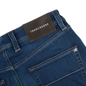 A pair of Tramarossa Blue Leonardo Zip 6 Months Heritage Jeans with a label that says team morosa, offering ultimate comfort.