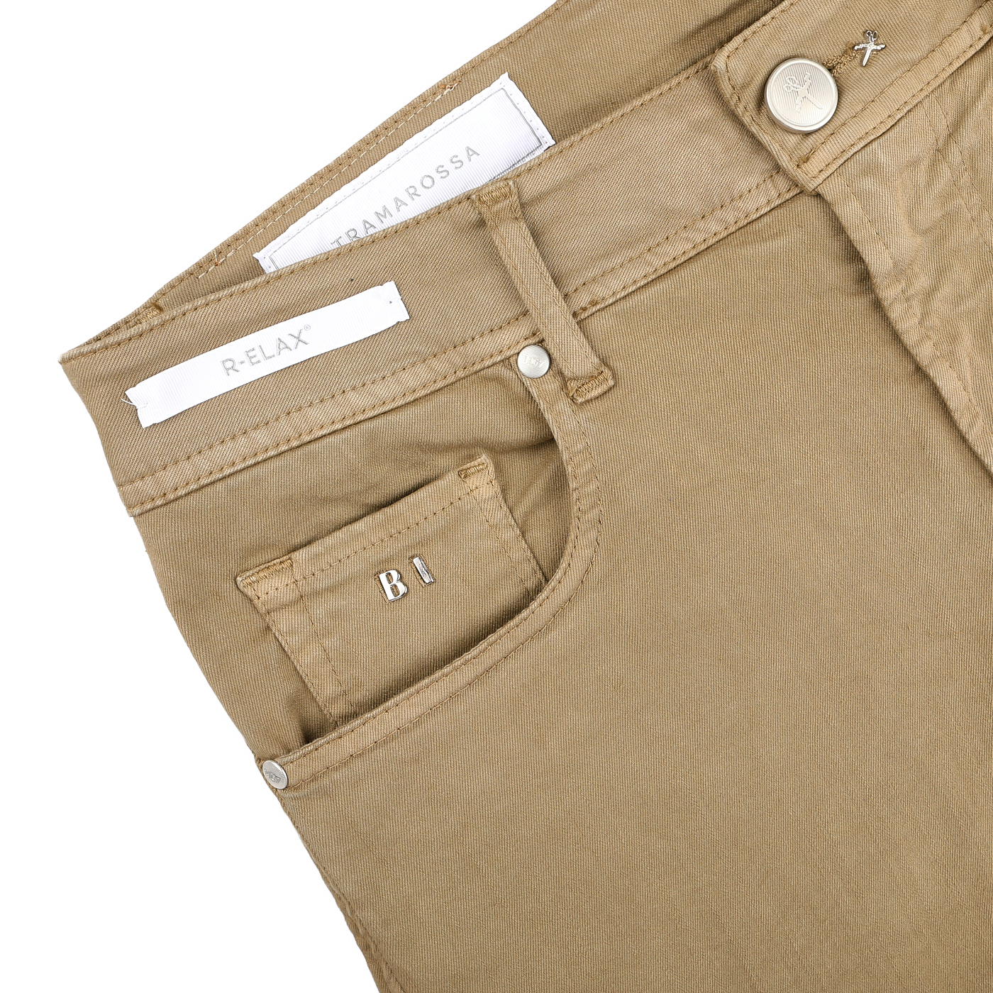 The Tramarossa Desert Beige Super Stretch Michelangelo Jeans feature visible pockets, belt loops, and buttons with label and stitching details, crafted from super stretch denim for comfort.