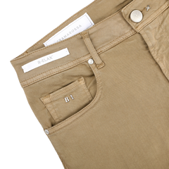 The Tramarossa Desert Beige Super Stretch Michelangelo Jeans feature visible pockets, belt loops, and buttons with label and stitching details, crafted from super stretch denim for comfort.