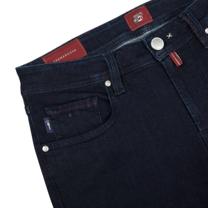 A pair of Raw Blue Super Stretch Michelangelo jeans by Tramarossa with red stitching in comfort stretch denim.