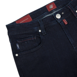 A pair of Raw Blue Super Stretch Michelangelo jeans by Tramarossa with red stitching in comfort stretch denim.