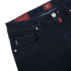 A pair of Raw Blue Super Stretch Michelangelo jeans by Tramarossa with red stitching in comfort stretch denim.