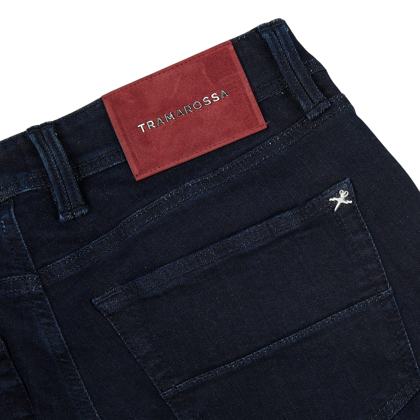 A pair of Raw Blue Super Stretch Michelangelo jeans from Tramarossa with a slim fit and a red label on the back.