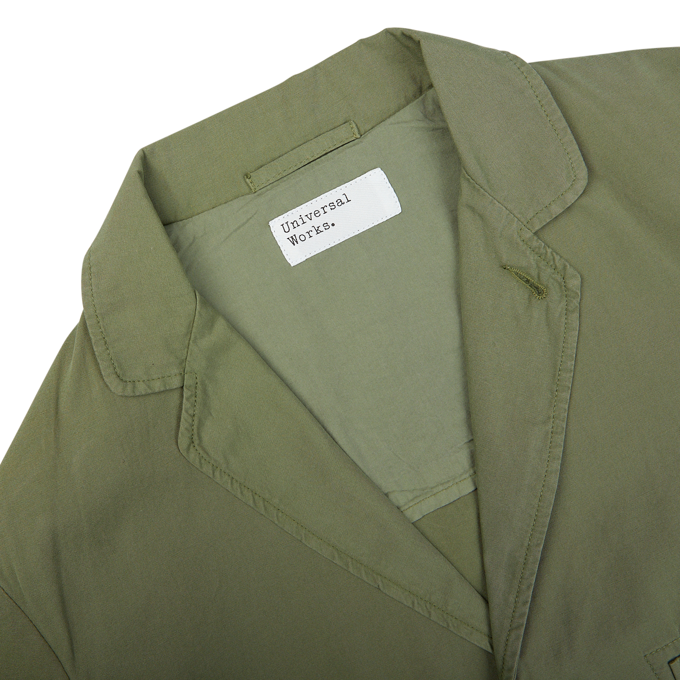 Birch Green Cotton Summer Canvas 5-Pocket Jacket with a label showing the brand "Universal Works".
