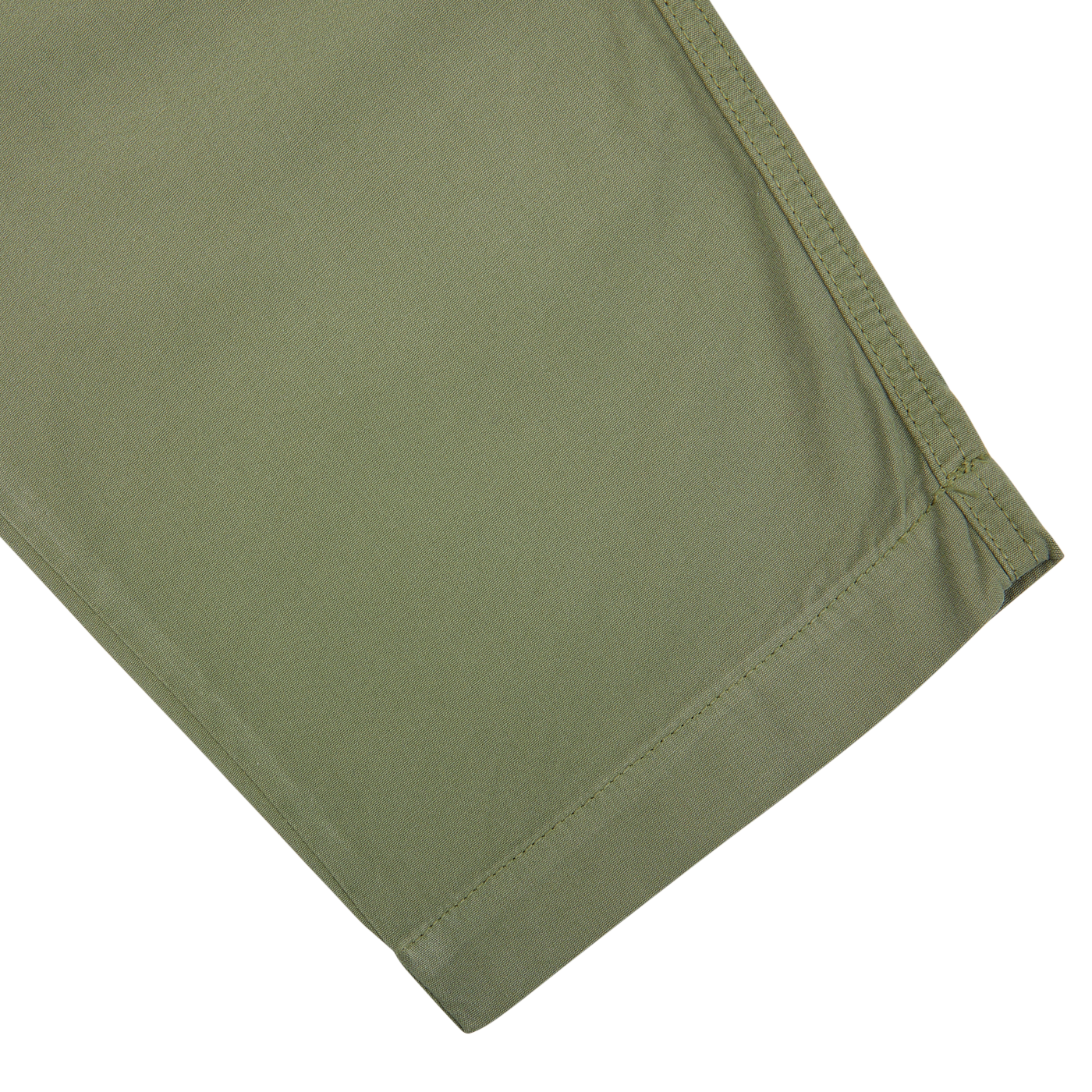 Green Birch Green Cotton Summer Canvas Military Chinos fabric with double-stitch hem on a white background by Universal Works.