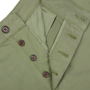 Birch green cotton canvas shirt with buttoned front placket and chest pocket detail by Universal Works.