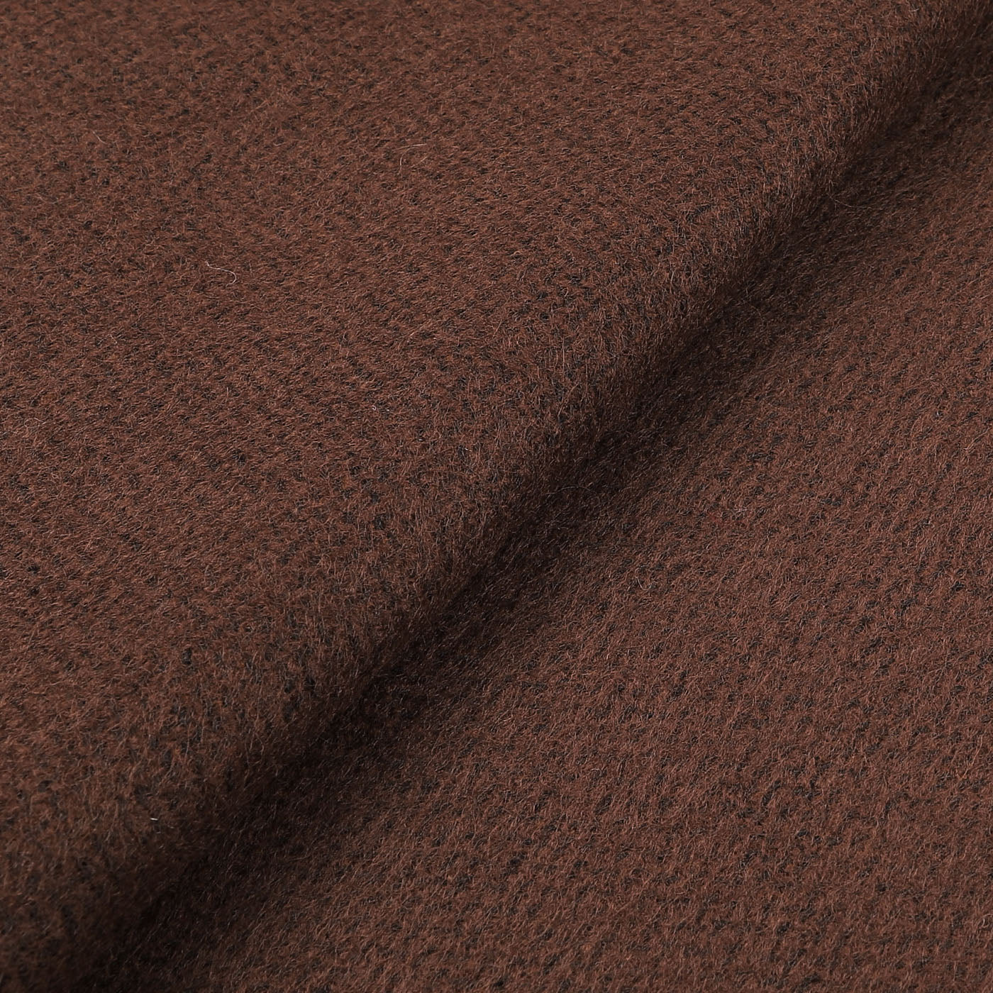 Close-up image of a brown acrylic fabric with a textured surface, ideal for crafting a Universal Works Brown Double Sided Acrylic Scarf.