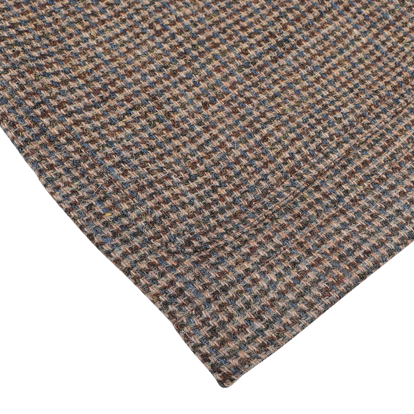 Close-up of a textured fabric with a small houndstooth pattern in shades of brown and gray, perfect for crafting the stylish Universal Works Brown Melange Harris Tweed Bakers C Jacket.