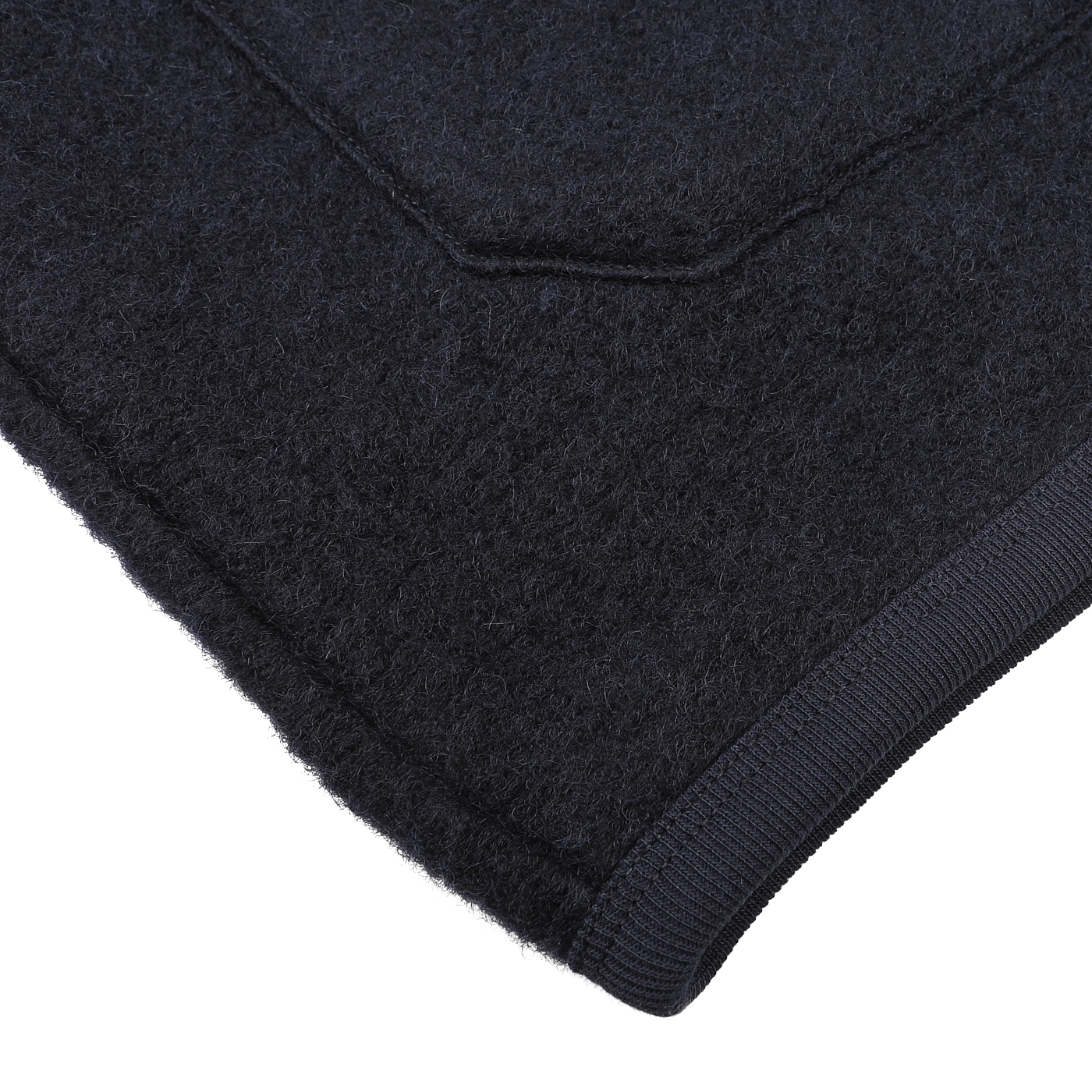 Close-up of the Universal Works Navy Blue Wool Fleece Cardigan, showcasing its textured fabric, visible seam, and ribbed edge.