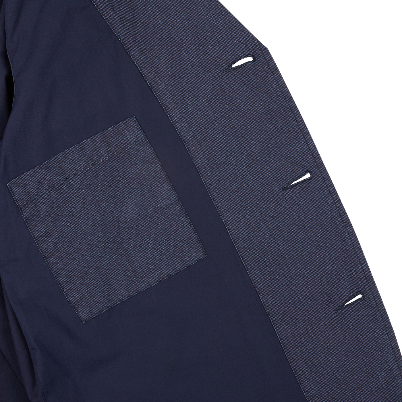 The back of a navy blue Universal Works Navy Puppytooth Linen Cotton 3-Button Jacket with two pockets.