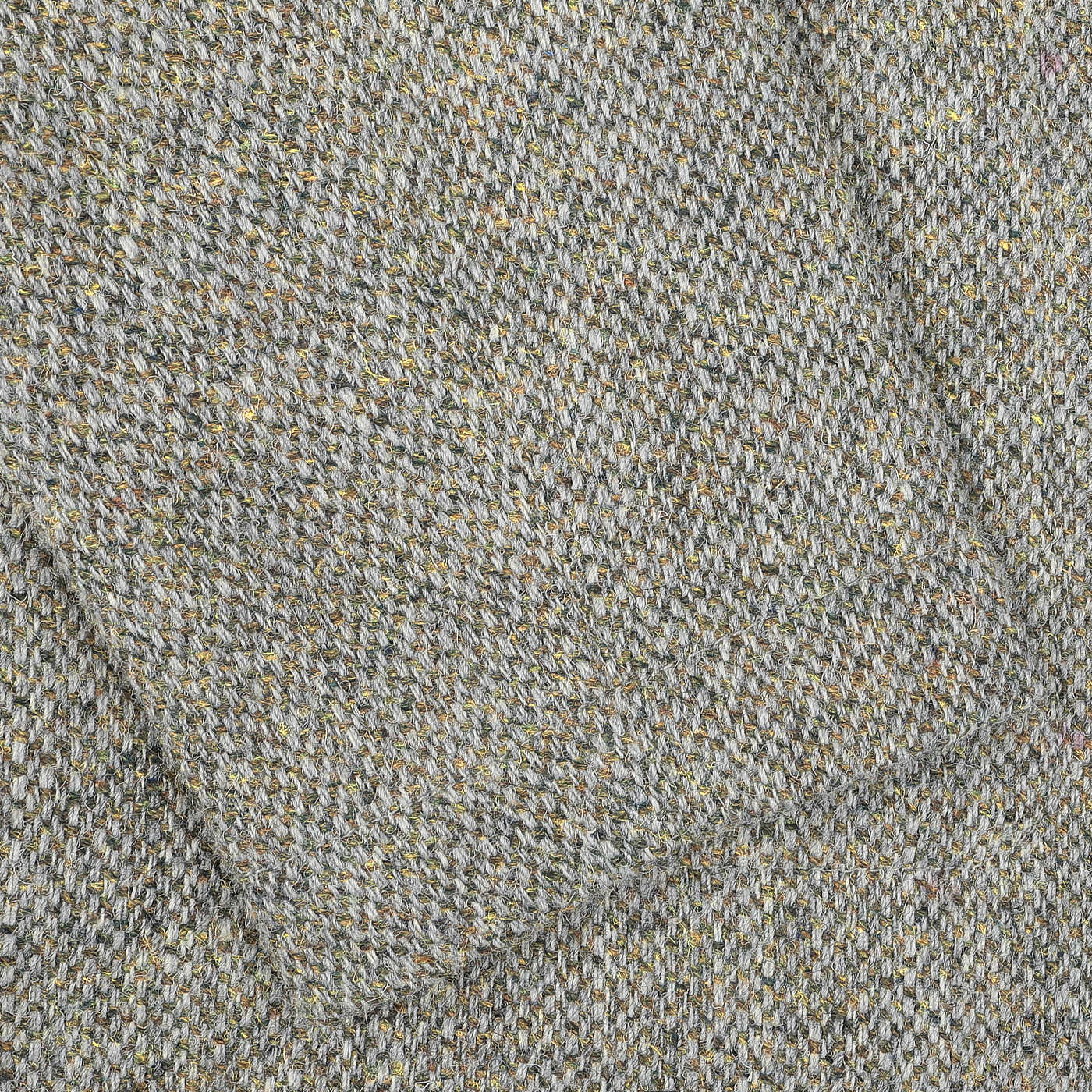 Close-up of the Olive Melange Harris Tweed fabric from Universal Works, highlighting the textured pattern of woven threads interspersed with small specks of various colors—ideal for crafting a classic Bakers C Jacket.