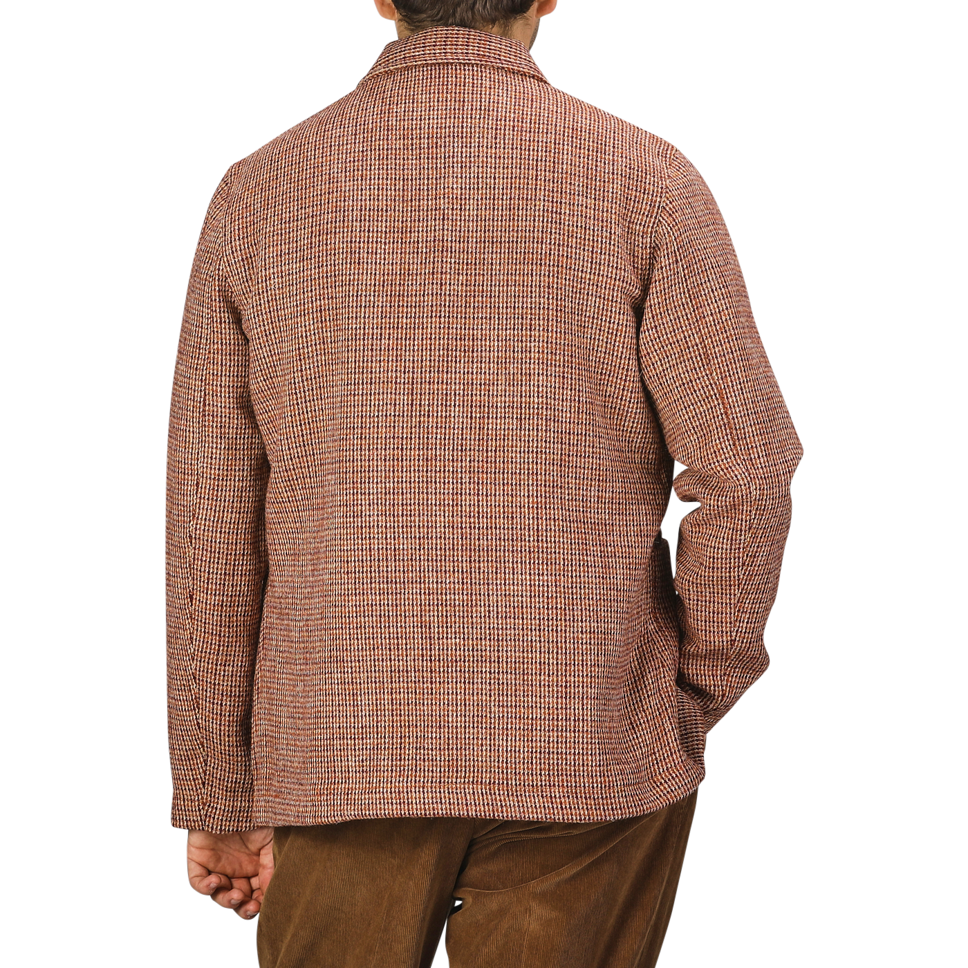 A person is shown from the back wearing a Rust Orange Harris Tweed Bakers C Jacket from Universal Works and matching brown pants.