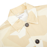 A Universal Works Sand Beige Camo Cotton Bakers C Jacket crafted from cotton.