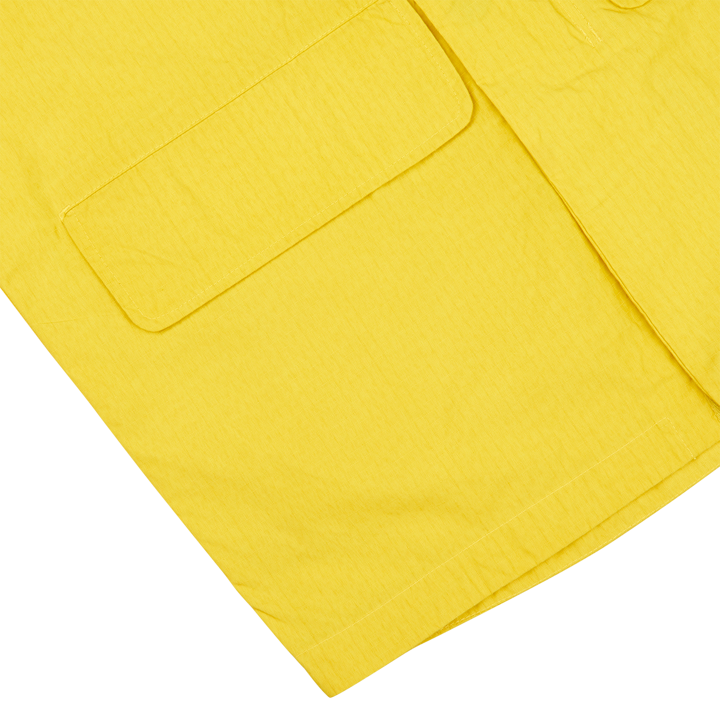 An image of a water-resistant Yellow Cotton Ripstop Stanedge Jacket by Universal Works with pockets.