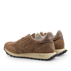 A pair of Start City Sneakers by Valsport, featuring a beige suede leather upper, white soles with textured grip patterns, and the iconic Valsport logo on the sole.