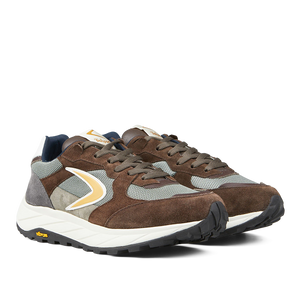 A pair of Valsport outdoor dark brown leather nylon Vibram sneakers with white and yellow accents on a transparent background.