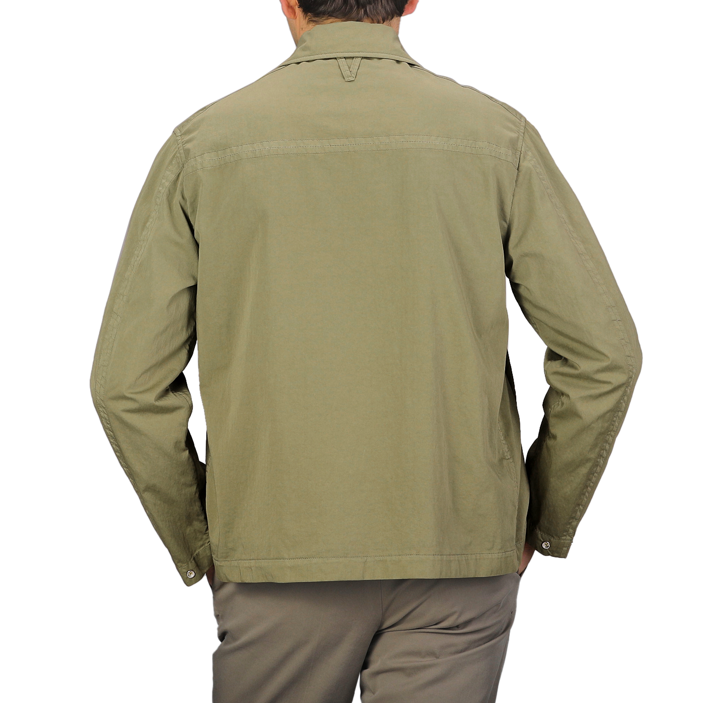 A person wearing a Valstar Green Soft Cotton Nylon Coach Jacket and brown pants is facing away from the camera against a gray background.