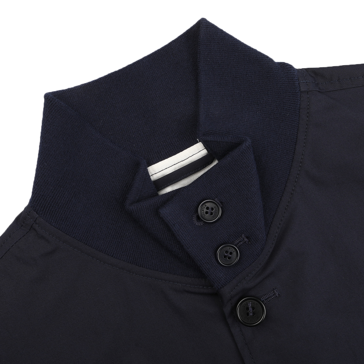 Close-up of a Valstar Navy Blue Cotton Poplin Valstarino jacket featuring a ribbed high collar and three black buttons with a striped inner collar detail, inspired by the A-1 fighter pilot design for comfort and style.