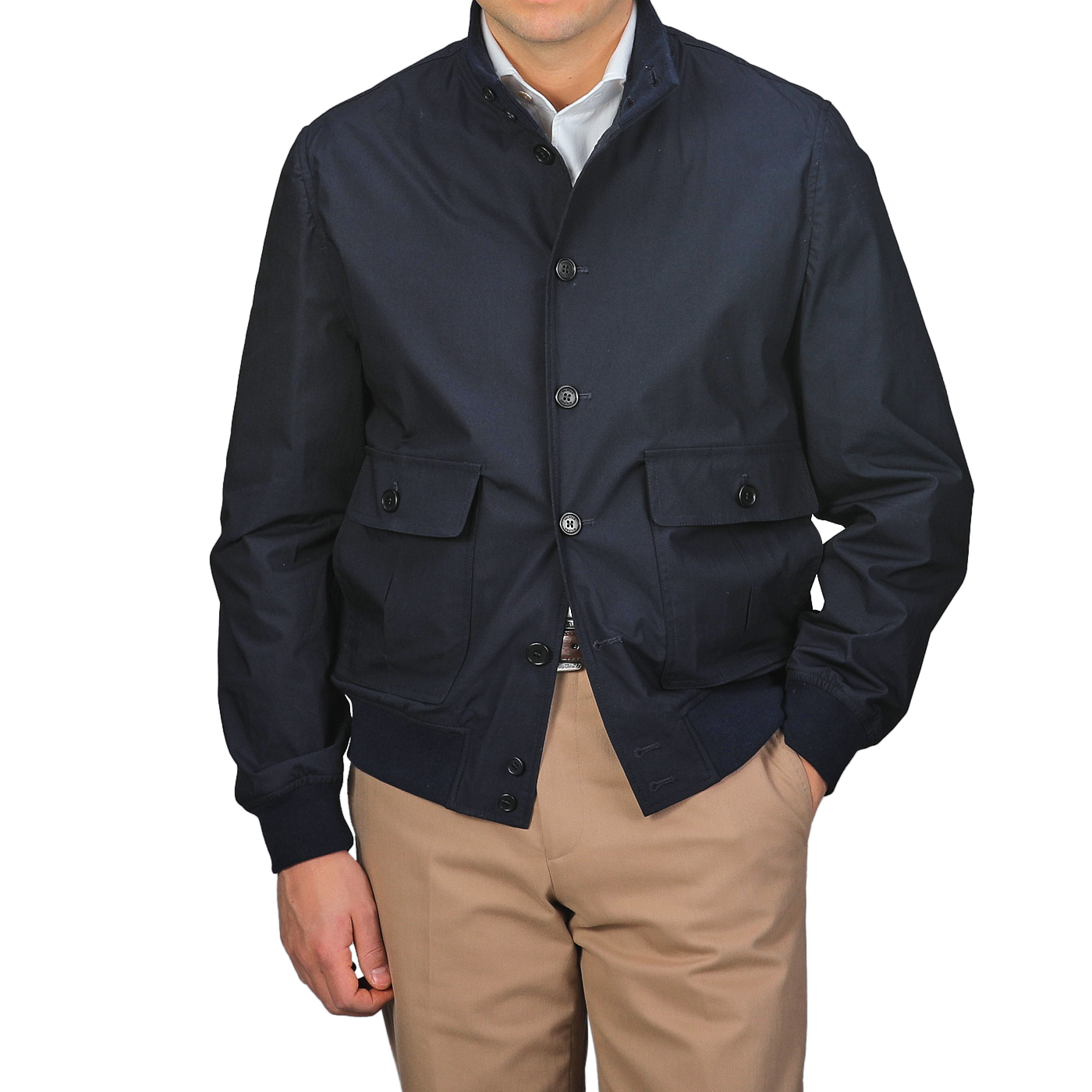 Standing against a gray background, a person wears the Valstar Navy Blue Cotton Poplin Valstarino Jacket over a white shirt and beige pants.