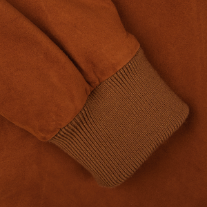 Close-up of a Valstar Sandal Brown Suede Leather Valstarino Jacket with a ribbed cuff detail.