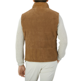 Werner Christ Tobacco Brown Suede Leather Alberto Gilet, wearing a suede leather vest with Primaloft technical padding.