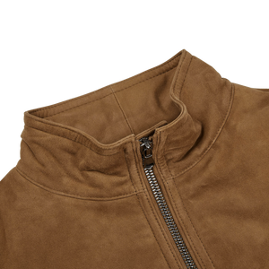 A close up of a Werner Christ Tobacco Brown Suede Leather Alberto Gilet.