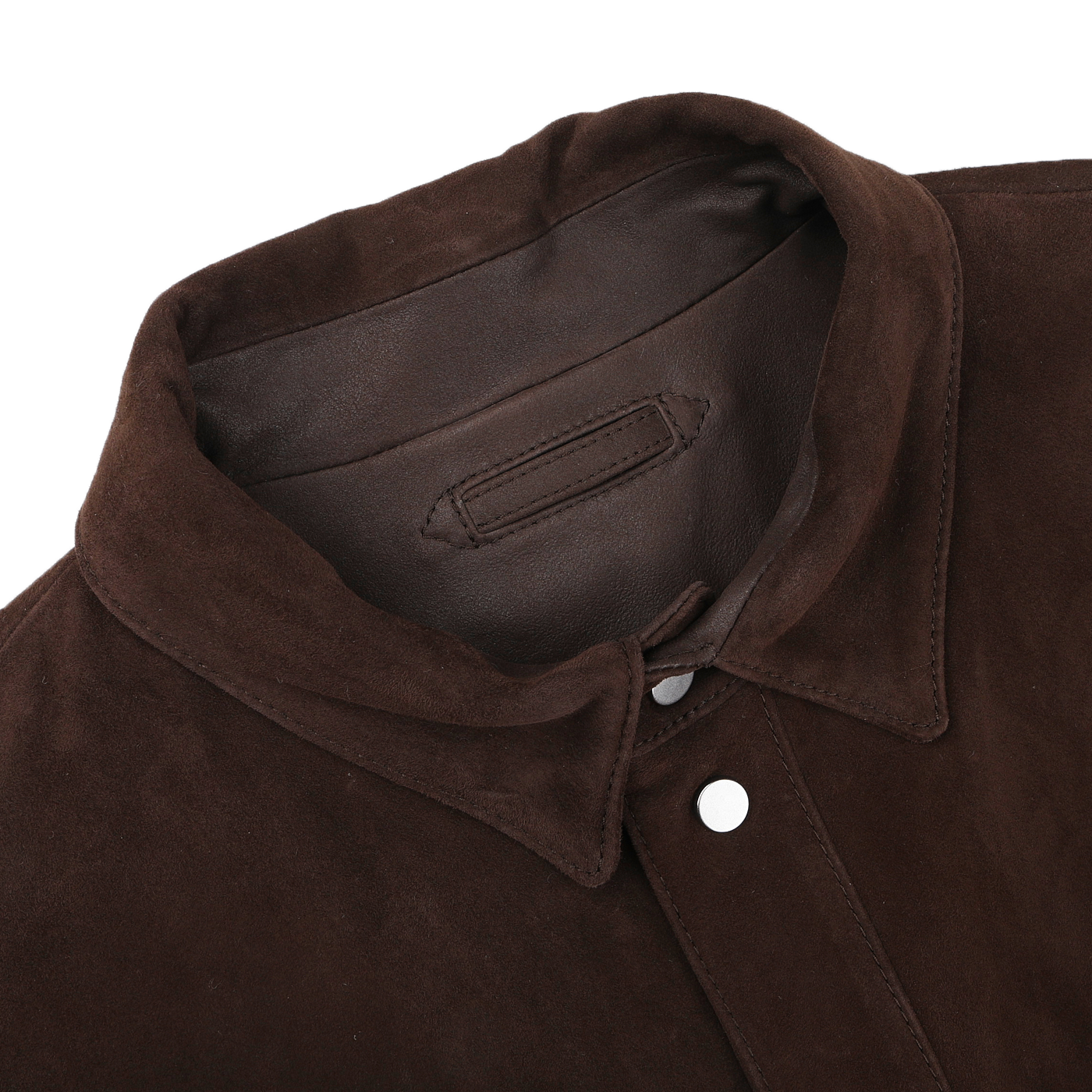 Close-up of a Werner Christ Dark Brown Suede Leather Amaro Shirt Jacket collar with a regular fit and button-up design on a white background.