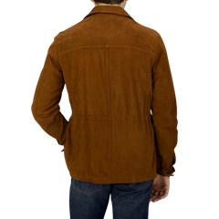 The back view of a man wearing a Werner Christ Sandalwood Suede Leather Anton Jacket.