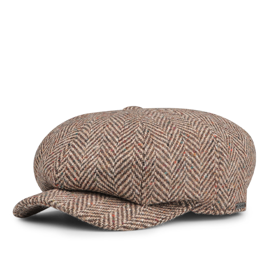 A beige herringbone newsboy cap with a short brim, crafted from luxurious wool tweed, by the brand Wigéns.