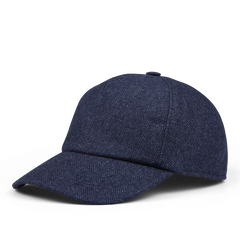 The Wigéns Blue Herringbone Angelico Wool Baseball Cap boasts a dark blue herringbone pattern and features an adjustable strap, curved brim, and a button on top. The luxurious wool is expertly woven in Italy.