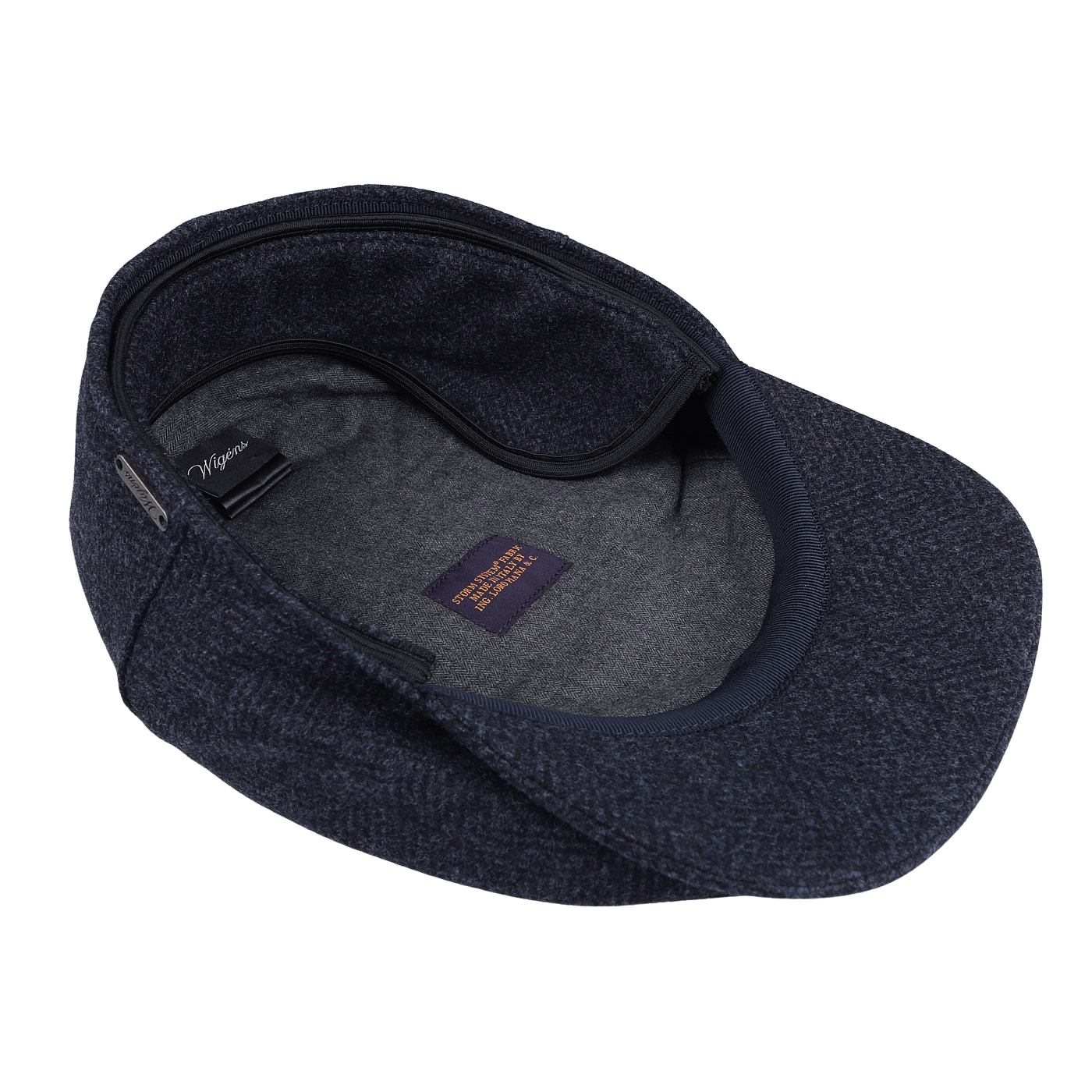 The Blue Herringbone Wool Ivy Contemporary Cap by Wigéns features a navy blue herringbone pattern crafted from pure wool. The interior, seen in the image, is lined with soft fabric and prominently displays a label.