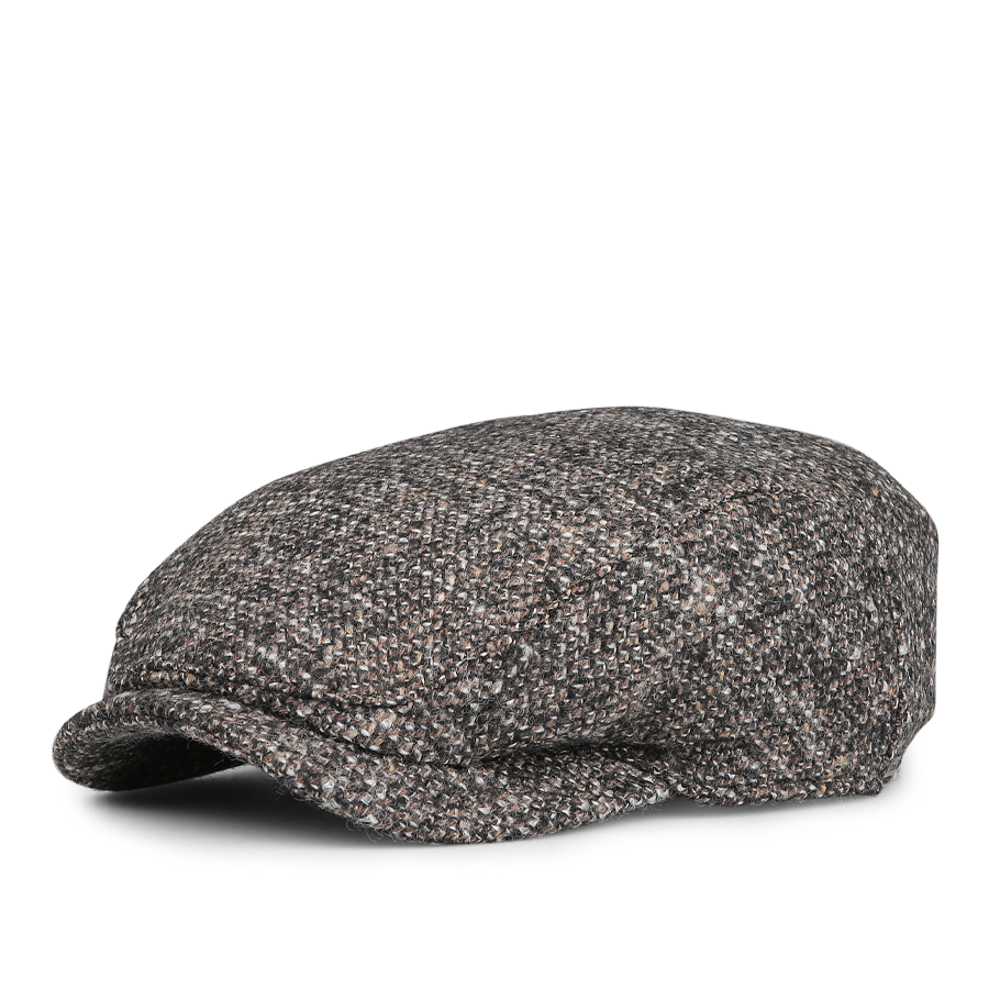 A side view of Wigéns' Brown Melange Wool Ivy Contemporary Cap, featuring a textured wool blend in gray and brown shades.