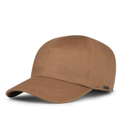 The Camel Loro Piana Cashmere Baseball Cap by Wigéns showcases a brown suede finish with a curved brim and a small metal tag on the side, adding a touch of casual elegance.