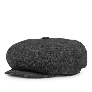 Wigéns' Grey Herringbone Wool Tweed Baker Boy Cap features a short, curved brim and a button on top.