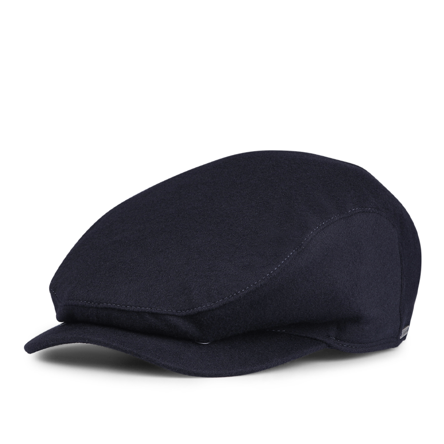 A Navy Blue Cashmere Ivy Contemporary Cap from Wigéns, featuring a rigid brim and soft crown, is showcased on a white background.