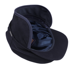 The Wigéns Navy Blue Cashmere Ivy Contemporary Cap, featuring ear flaps and a satin-lined interior, showcases modern style and warmth against a simple background.