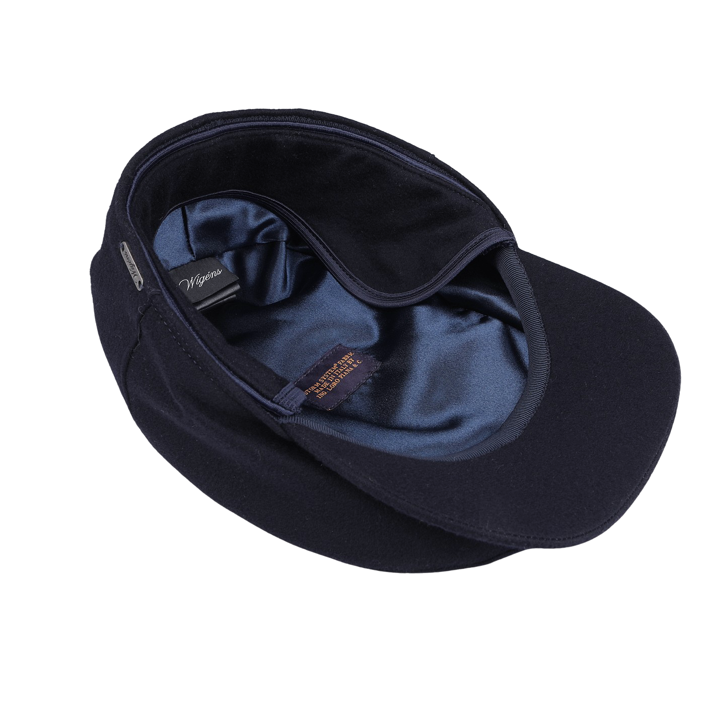 A navy blue cashmere ivy contemporary cap by Wigéns, complete with a satin lining, is displayed upside down against a white background to highlight its modern design.