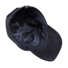 A Wigéns Navy Blue Cotton Moleskin Baseball Cap is showcased from above, highlighting its interior lining and structure.