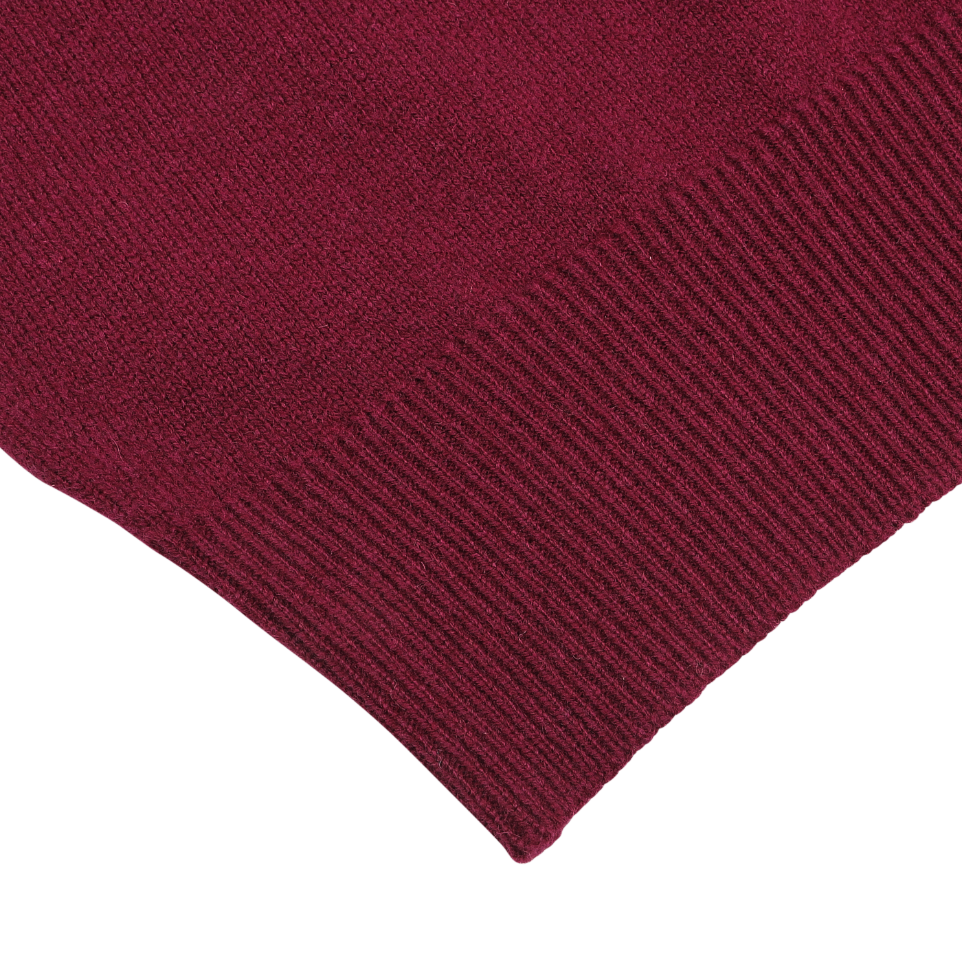 Close-up of a bordeaux knitted fabric with ribbed detailing along the edge, reminiscent of the Bordeaux Deep V-Neck Lambswool Sweater by William Lockie.