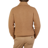 The back view of a man wearing a William Lockie Brown Camel Hair Shawl Collar Cardigan.