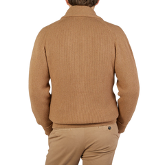 The back view of a man wearing a William Lockie Brown Camel Hair Shawl Collar Cardigan.