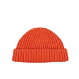 A Burnt Orange Cashmere Ribbed Short Beanie by William Lockie on a white background.