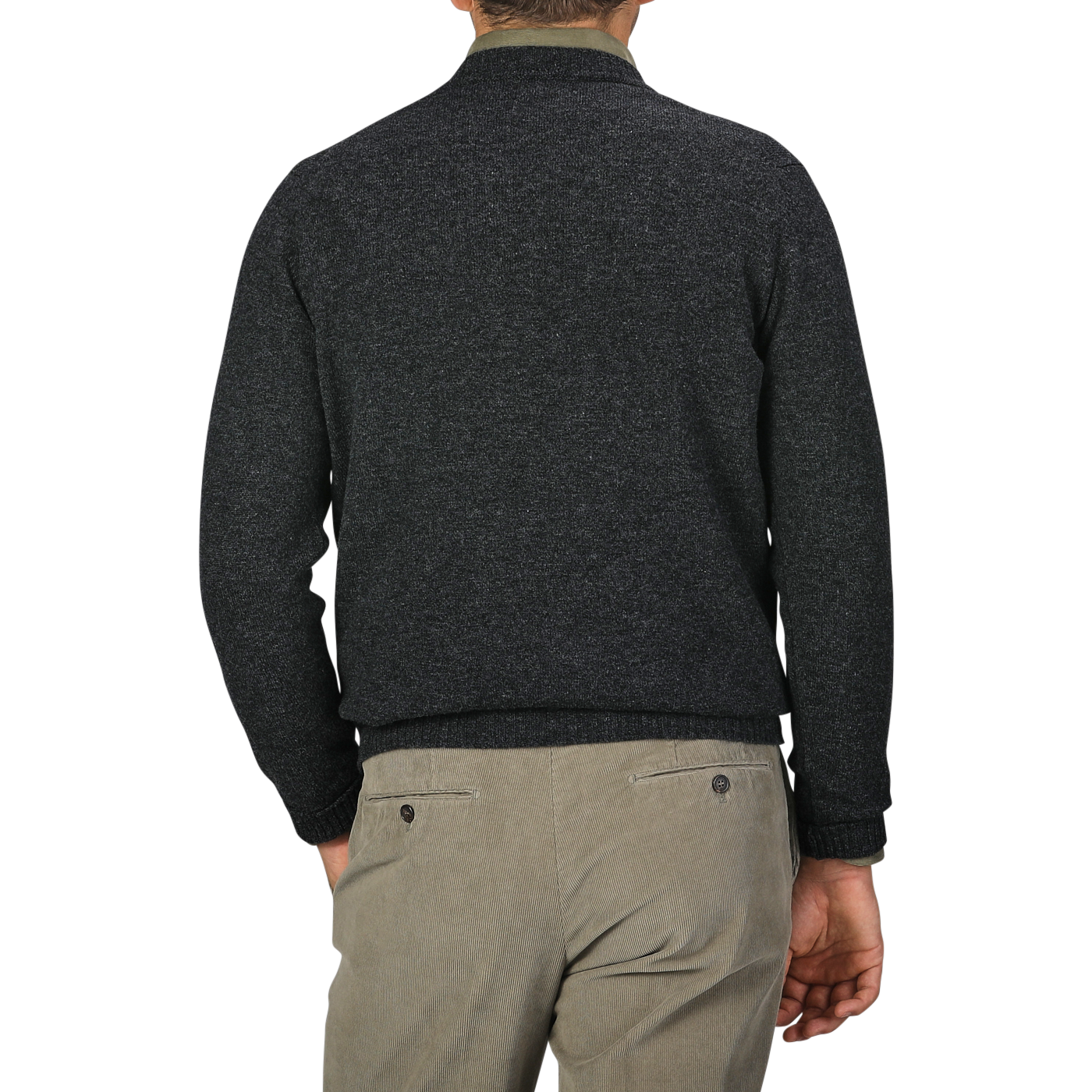 A person clad in a William Lockie Charcoal Grey Crew Neck Lambswool Sweater paired with light grey pants is shown from the back against a plain grey background, embodying a smart casual look.