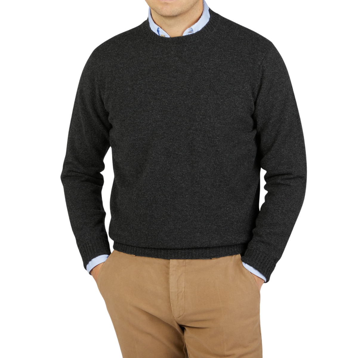 A man wearing a William Lockie Charcoal Grey Crew Neck Lambswool Sweater.